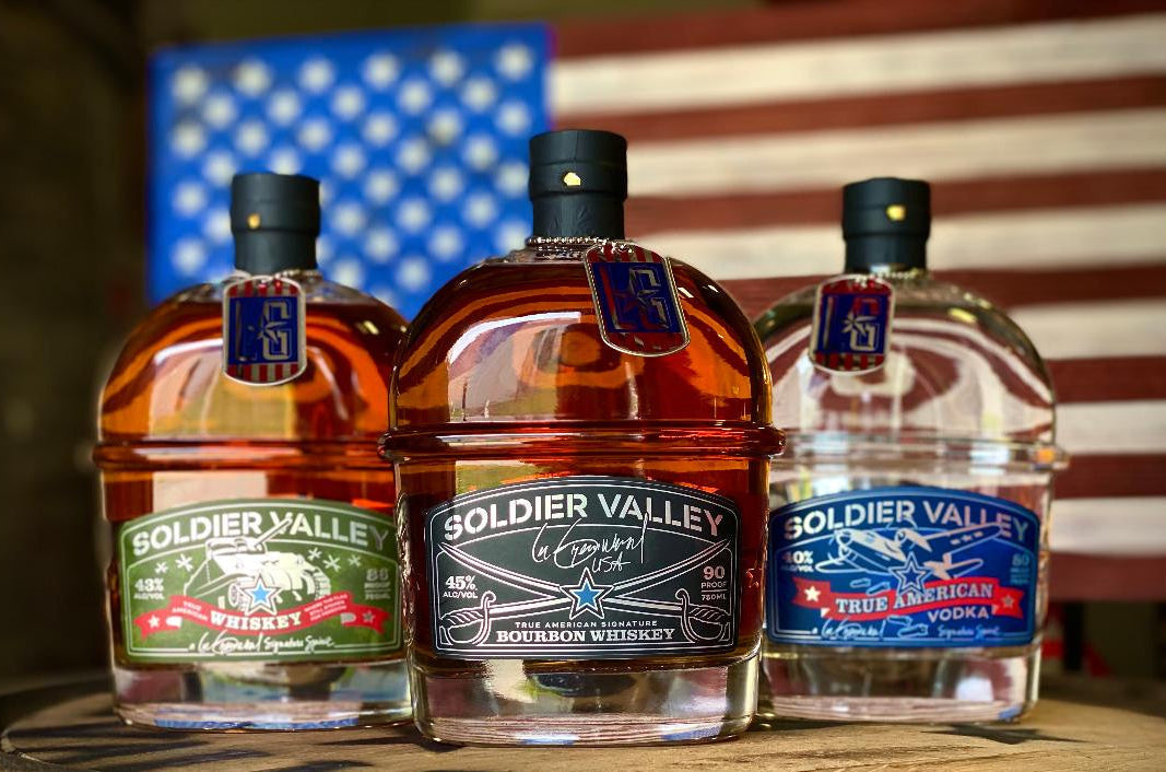 Soldier Valley Spirits America 250 Collection — Bourbon, Whiskey, and Vodka bottles with American flag
